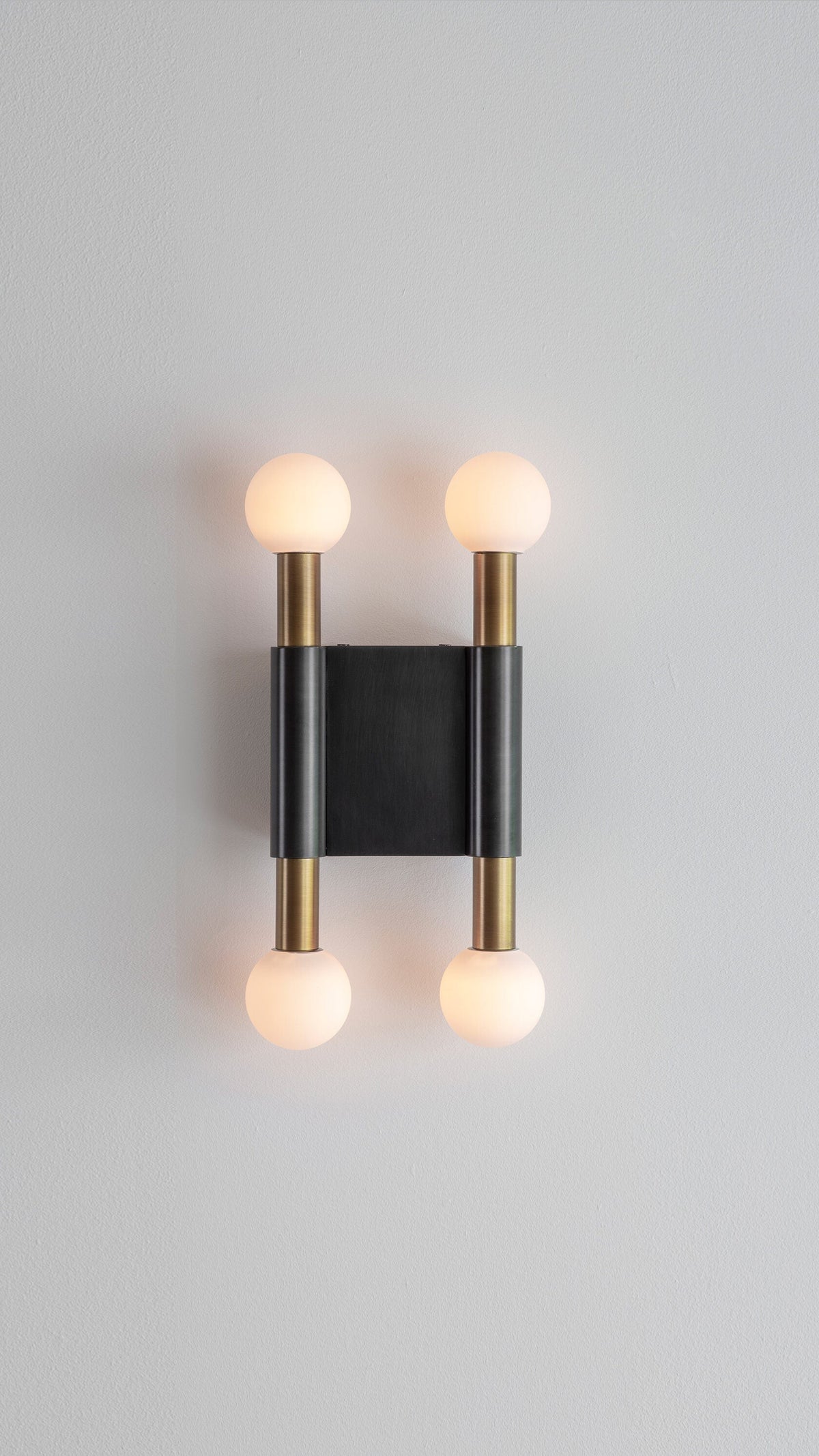 
Vomaria Brass Wall Lamp with Circular Glass Shades