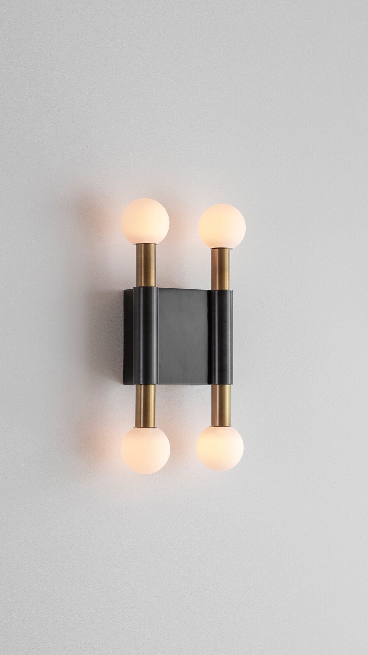 
Vomaria Brass Wall Lamp with Circular Glass Shades